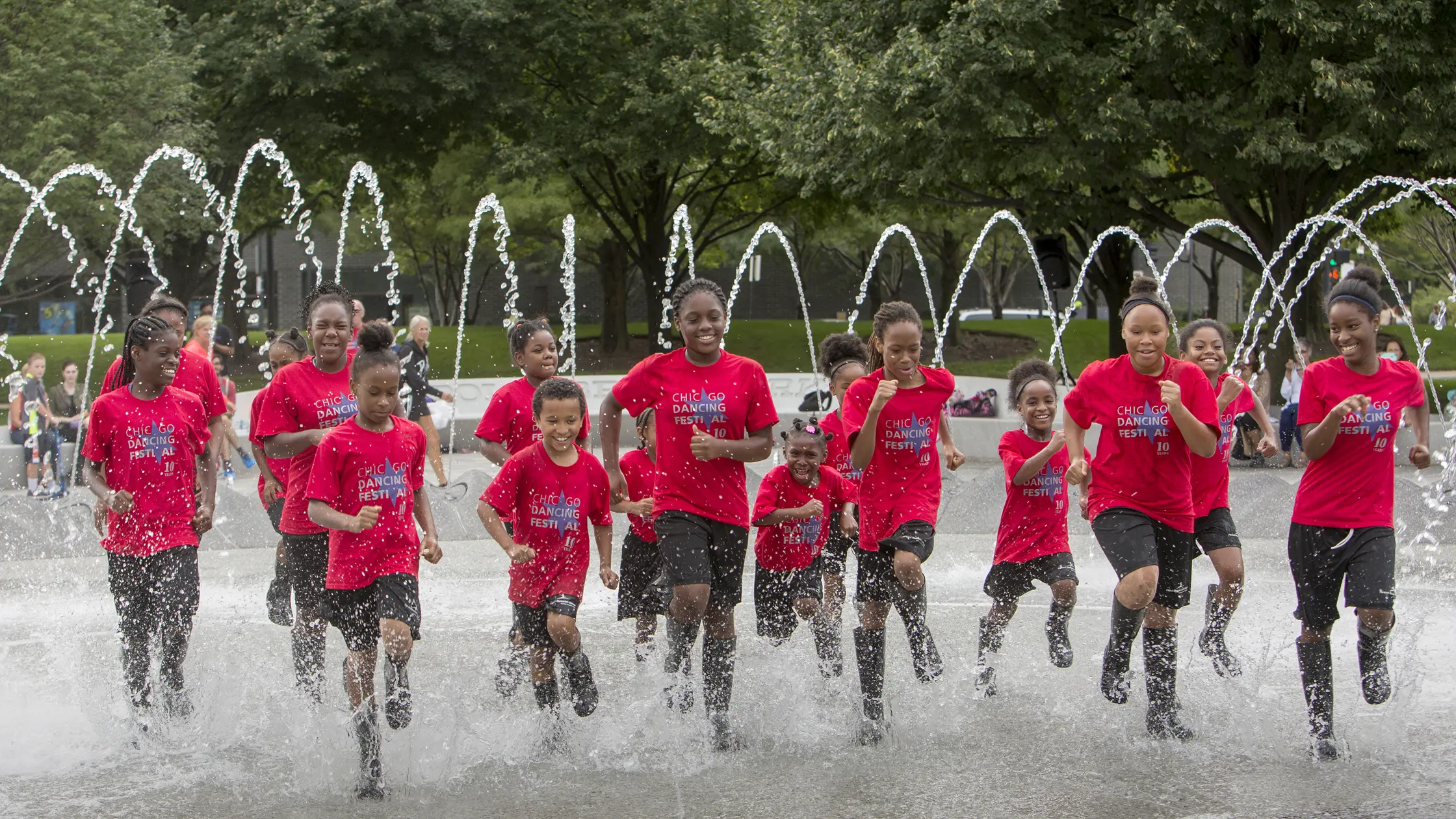 children in a fountain